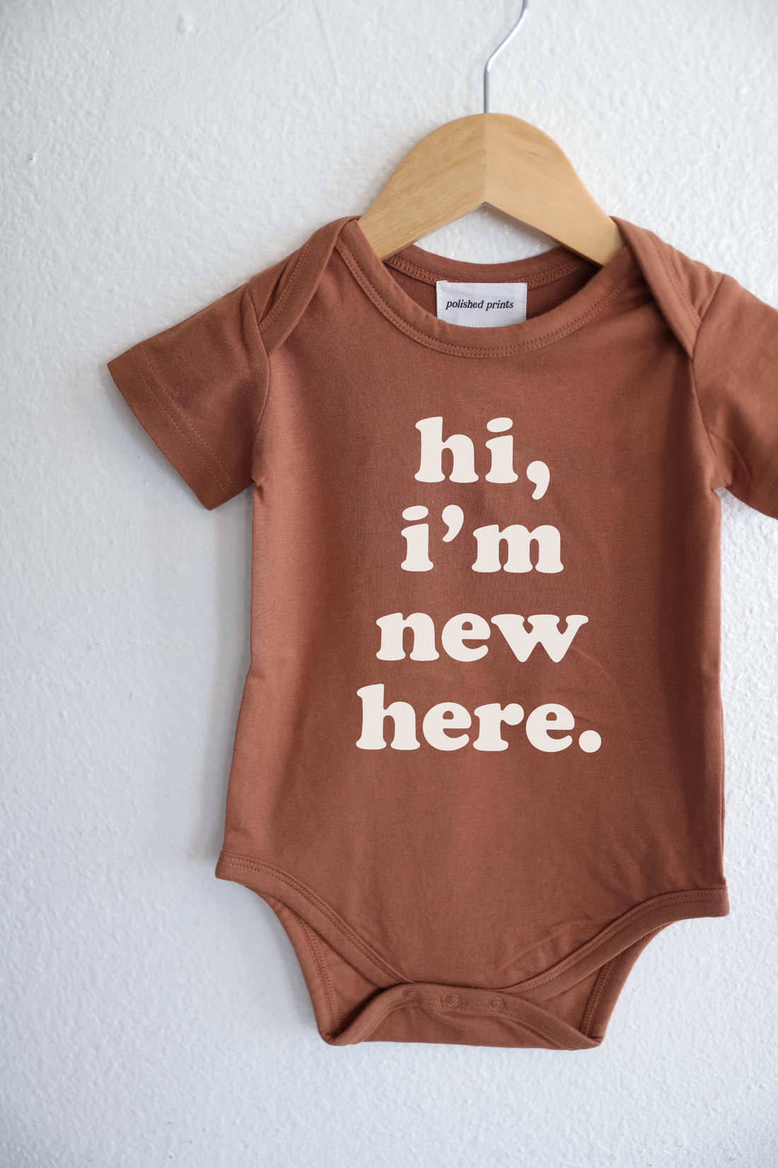 Polished Prints - Hi I'm New Here Baby Onesie
