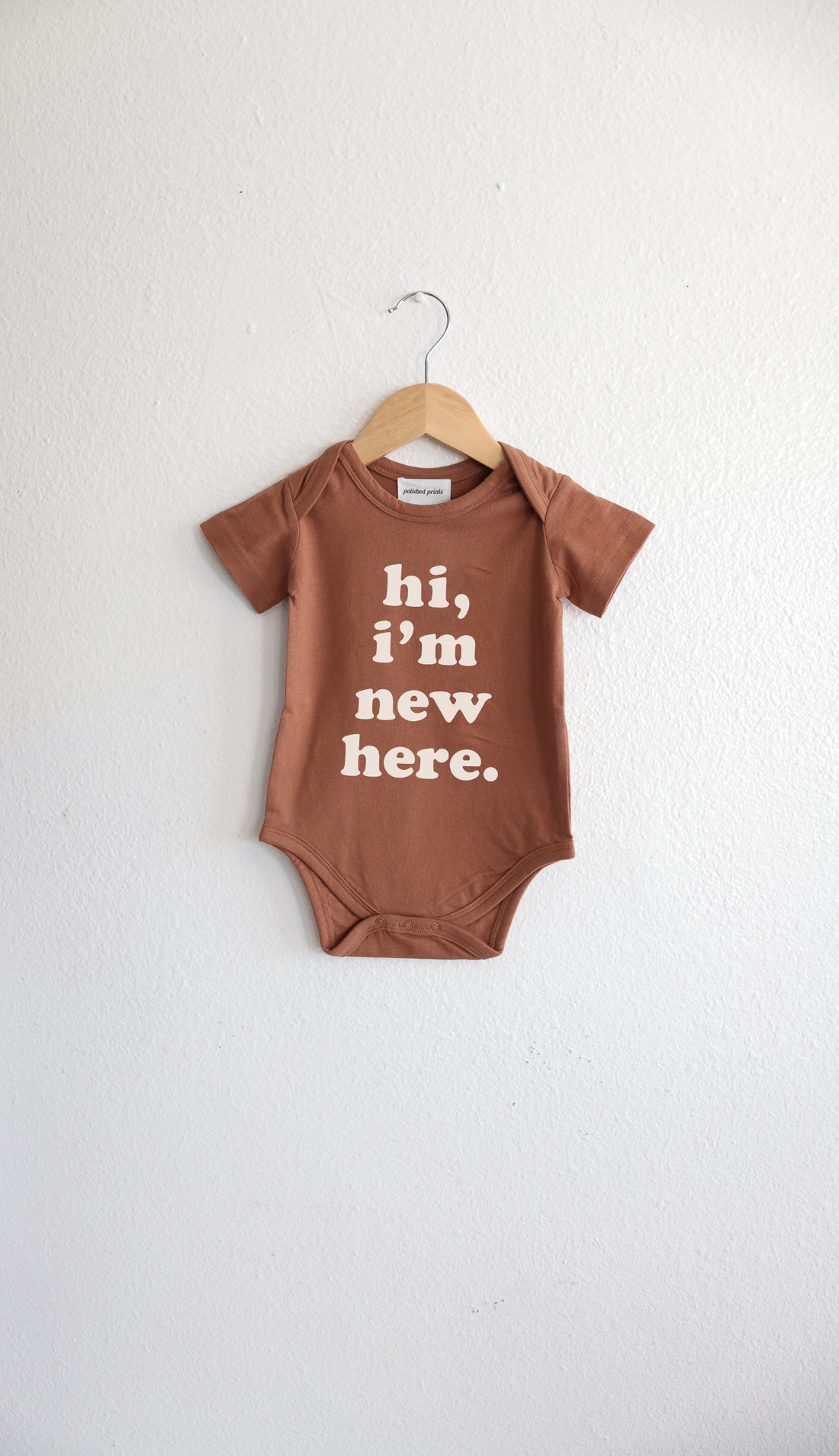 Polished Prints - Hi I'm New Here Baby Onesie